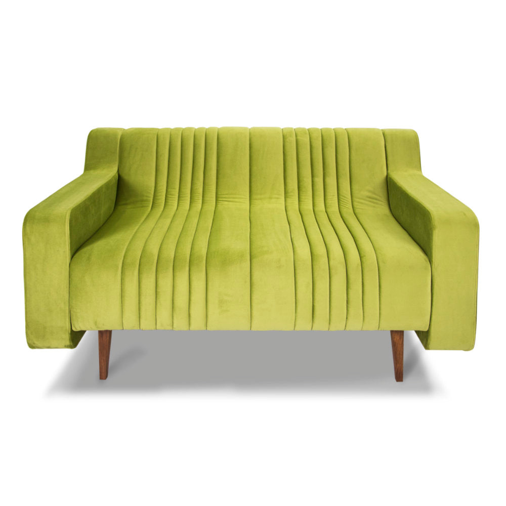 Introducing the Green Sofa by Tooba Furniture Factory—a modern three-seater in a vibrant lime green shade. This sofa features vertical seam detailing, wooden legs, wide armrests, and plush, upholstered fabric. Its sleek design effortlessly blends contemporary style with ultimate comfort.