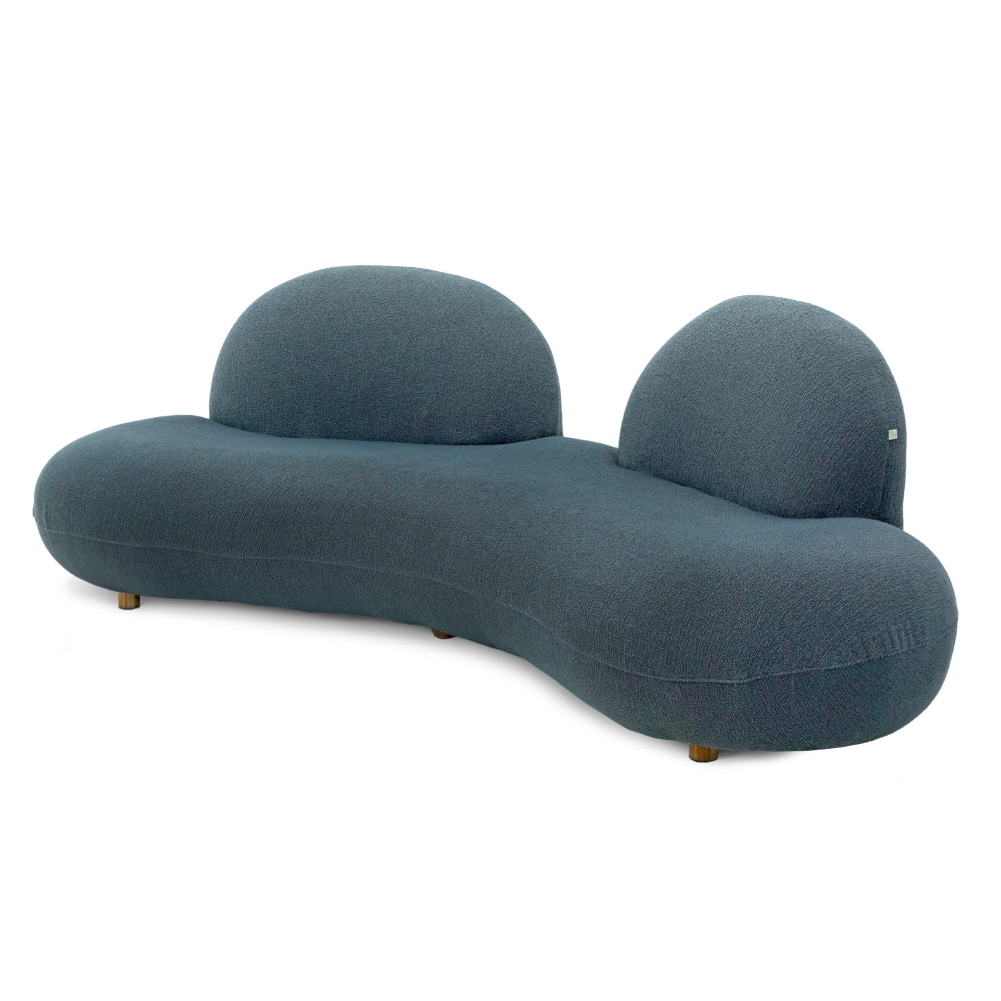 Introducing the Pacific Curved Sofa from Tooba Furniture Factory, a modern masterpiece with a wavy design and low profile. This dark teal sofa features two rounded backrests and elegant wooden legs, blending contemporary aesthetics with ultimate comfort.