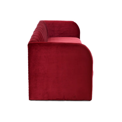 The Pixel Sofa by Tooba Furniture Factory boasts a vibrant red velvet finish with vertical tufting on both the back and seat cushions, complemented by low-profile armrests. This sleek contemporary piece exudes both comfort and elegance, making it a standout addition to any modern living space.