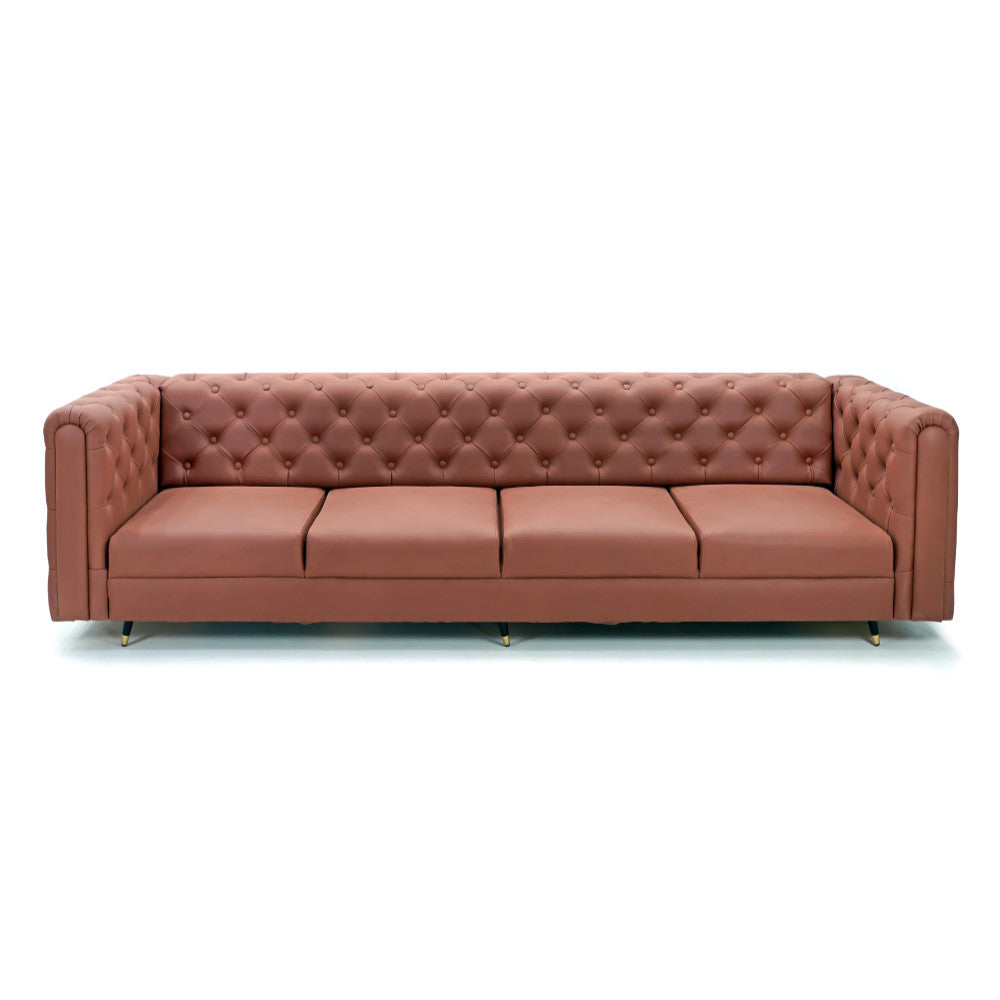 The Modern Chesterfield Sofa by Tooba Furniture Factory is a brown, tufted leather L-shaped couch with a large chaise lounge on the left side. This corner sofa features clean lines and sits on short black and gold legs, with upholstery detailed in a classic button-tufted pattern.