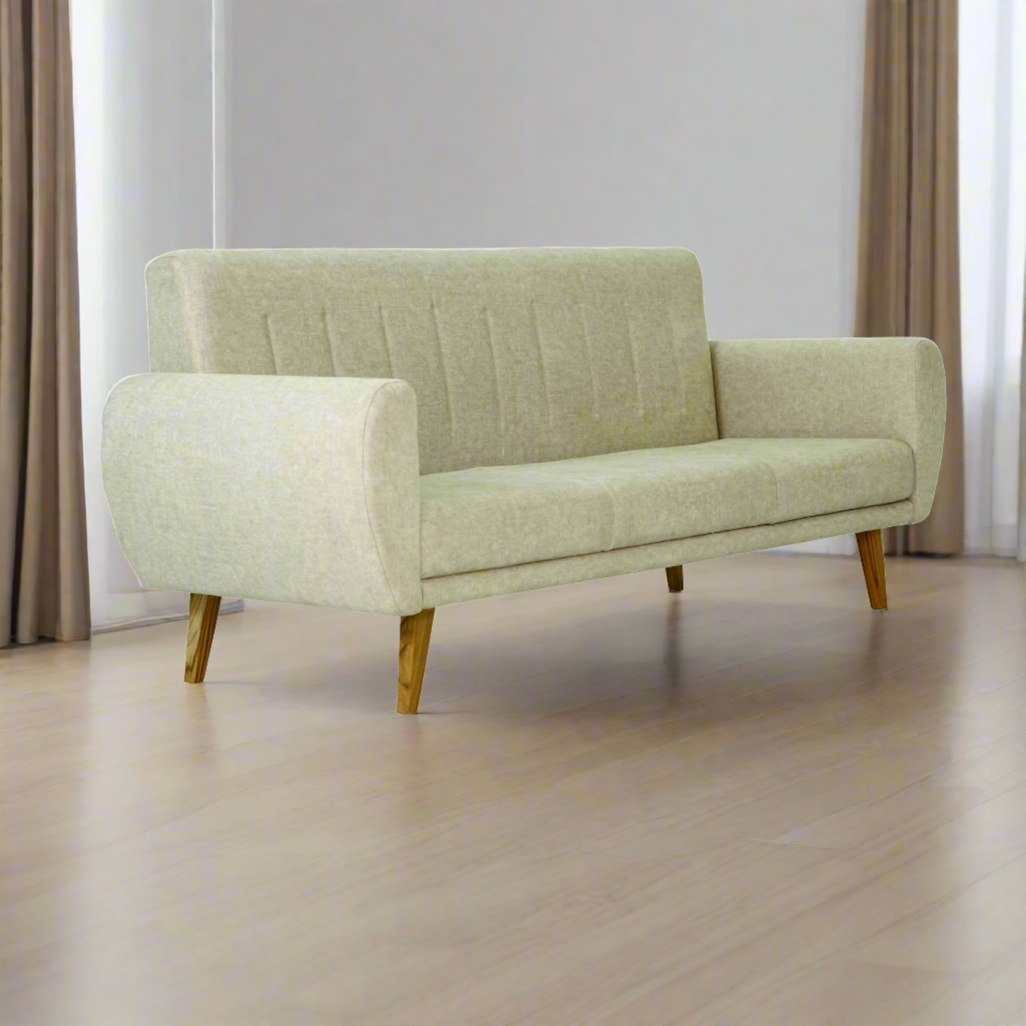 Tooba Furniture Factory presents the Arm sofa: a beige, mid-century modern piece with wooden legs and vertical stitching on the backrest. This minimalist design provides seating for up to three people, featuring slightly curved armrests and angled outward legs.