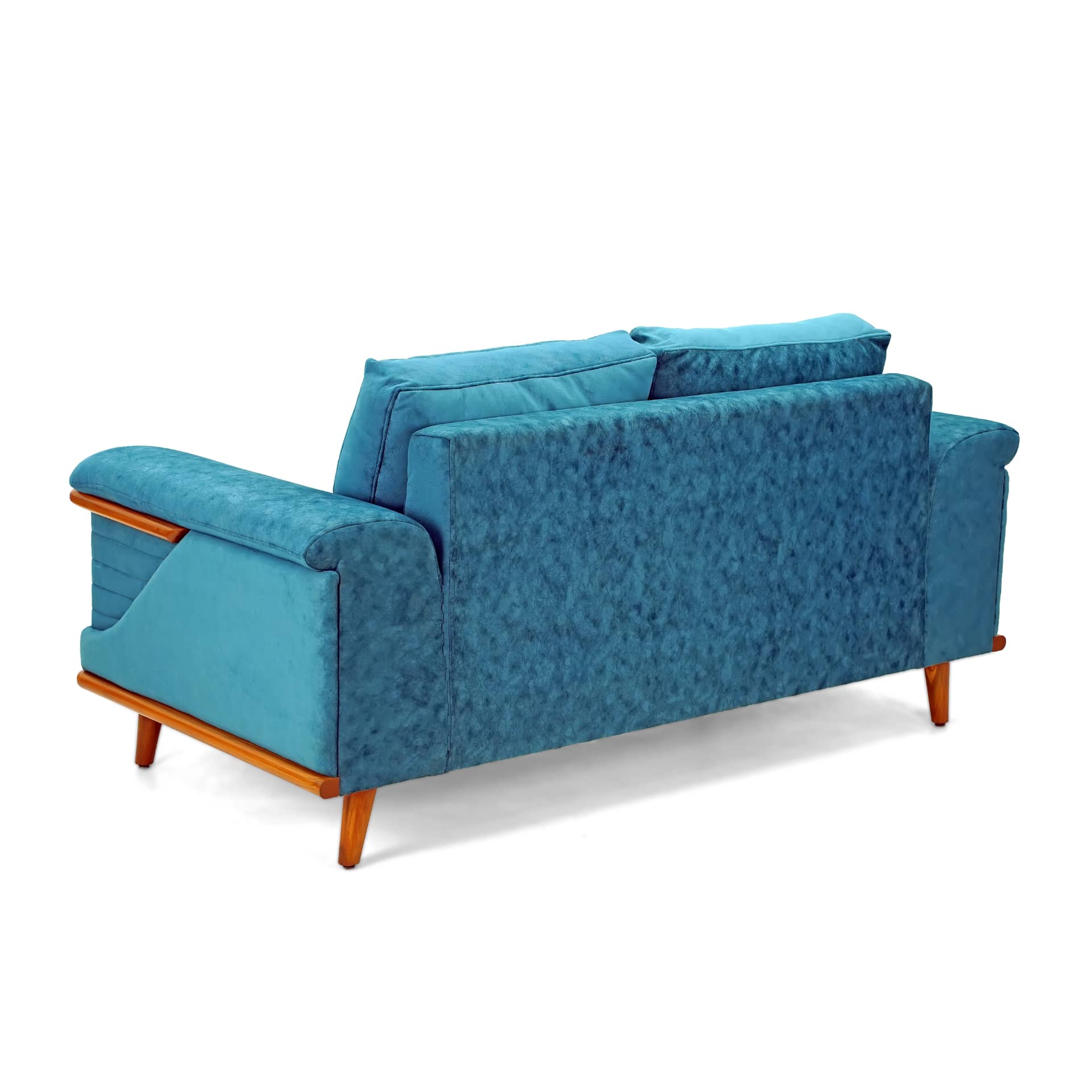 The Quantum Sofa by Tooba Furniture Factory is a modern teal upholstered piece that boasts a wooden frame and legs. It features simple, clean lines, cushioned armrests, and an angled backrest with a quilted design. Wooden accents enhance its stylish and contemporary appeal.